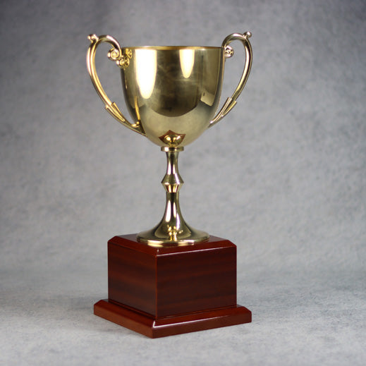 Gold Metal Cup On Rosewood Base